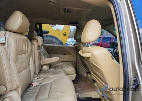 2010 Honda Odyssey Exl z USA, uszkodzony, nr VIN 5FNRL3H77AB081602